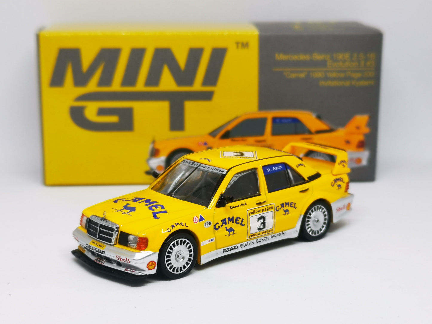 MINI GT 1:64 Mercedes-Benz 190E 2.5-16 Evolution II #3 Camel 1990 Yellow Page 200 Invitational Kyalami LHD ( With Extra Label)